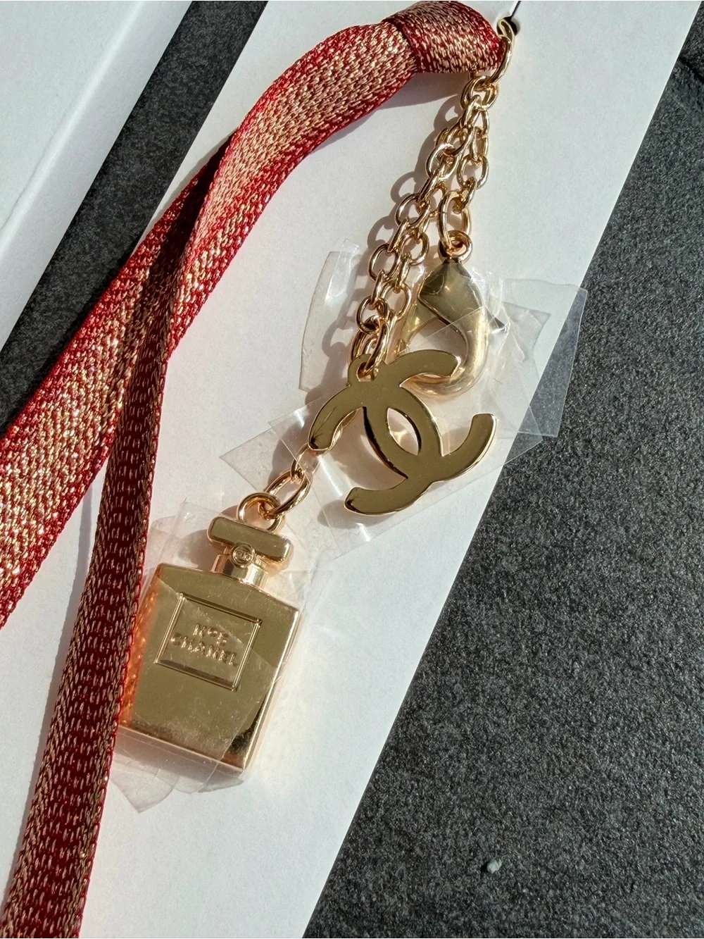 New CHANEL Novelty Gold CC & Perfume Bottle Charm with Red Ribbon